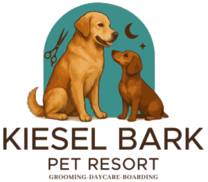 Illustration of two dogs with scissors and moon, representing Kiesel Bark Pet Resort. Doggie daycare Auburn services featured.